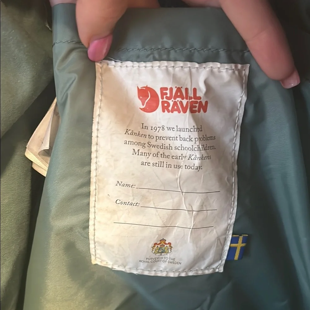 Fjallraven Kanken Forest Green Backpack with Red Logo